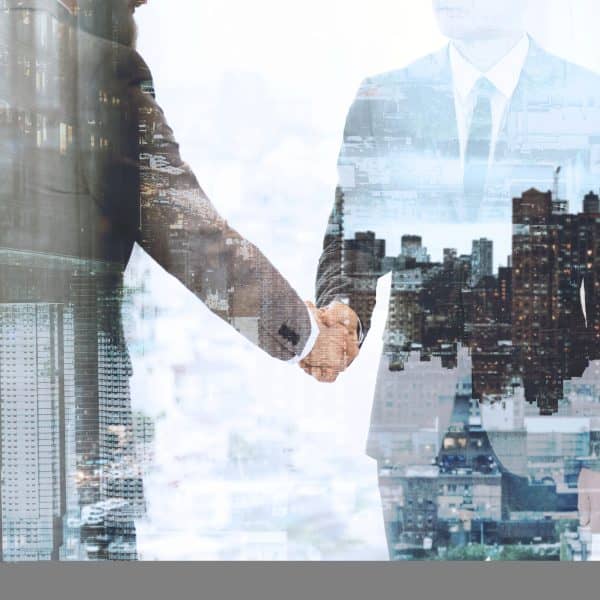 Corporate business handshake between business partners